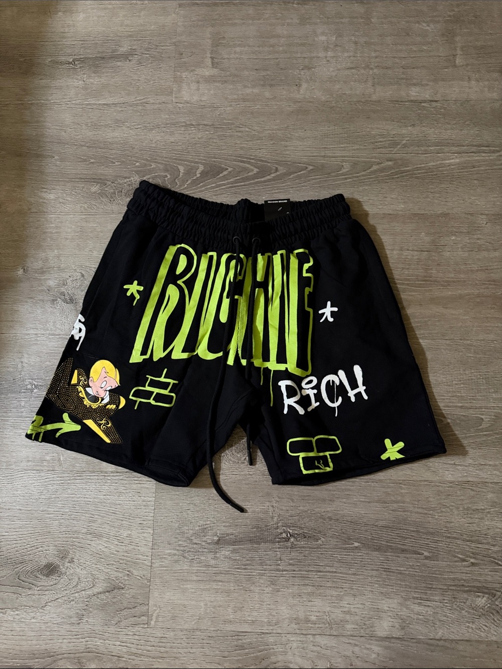 Reason Black Shorts with Neon Green Graphic Print
